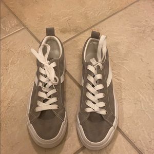 Grey and white sneakers